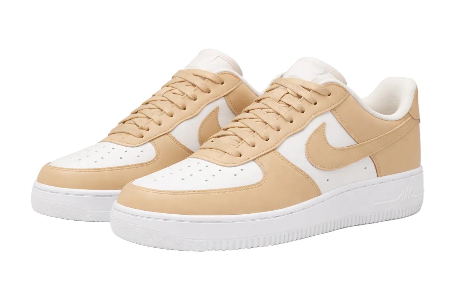 Beige and white sneakers with a Nike logo on a white background